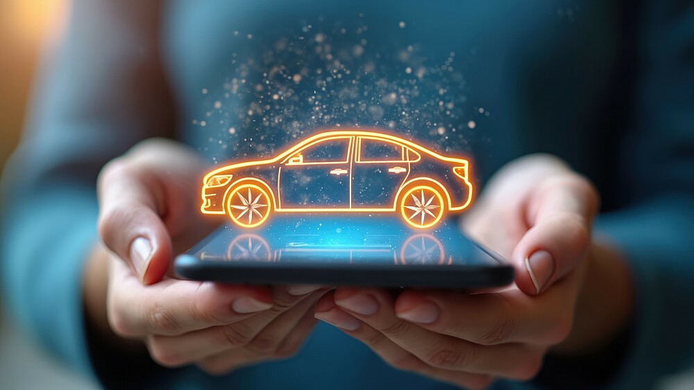 Hands holding smartphone with car icon symbol over screen. Buy or rent automobile online with mobile app. Digital service, transportation technology, online order.
